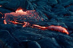 Preview image A mesmerizing view of flowing lava on a volcanic landscape, capturing the intense heat and …
